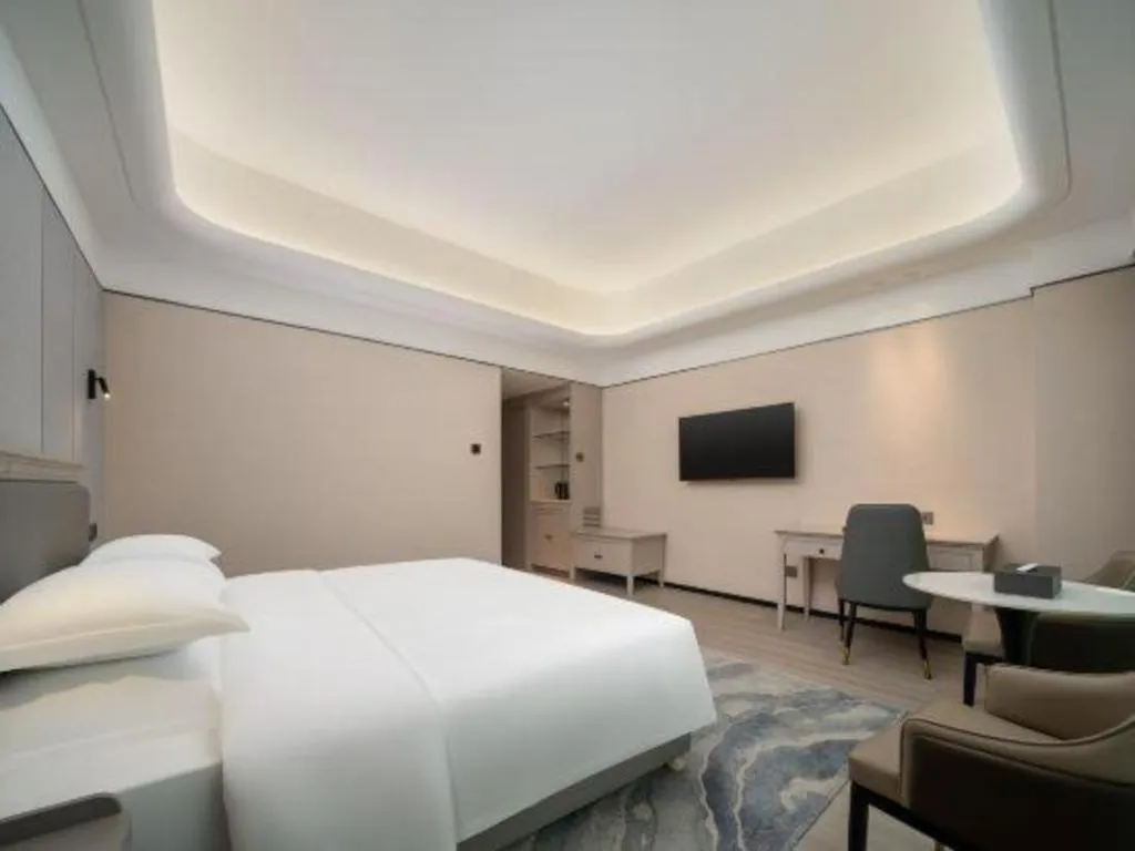 Bed in Zhuhai Dehan Hotel