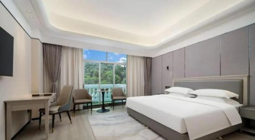 Bed in Zhuhai Dehan Hotel