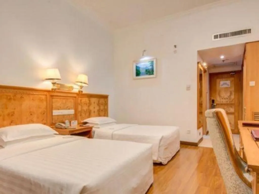 Bed in Zhuhai Dehan Hotel