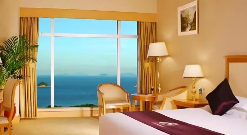 Bed in Zhuhai Dehan Hotel