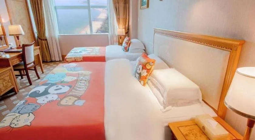 Bed in Zhuhai Dehan Hotel
