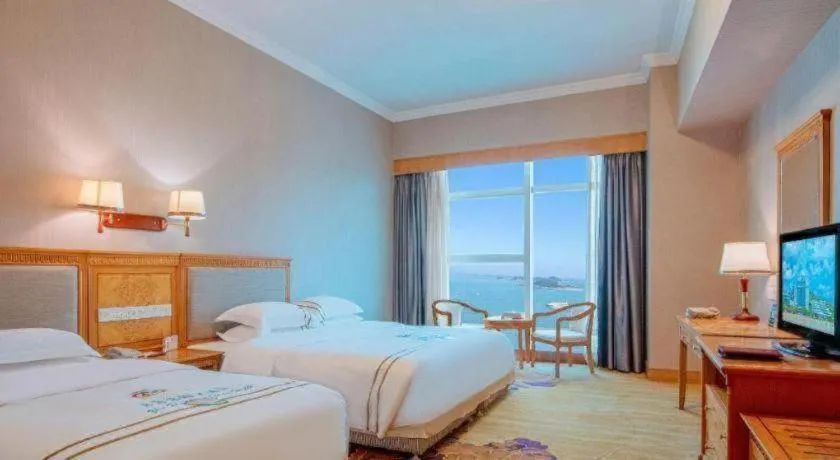 Bed in Zhuhai Dehan Hotel
