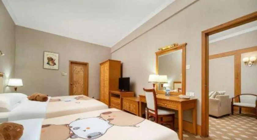 Bed in Zhuhai Dehan Hotel