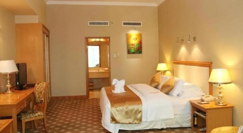 Bed in Zhuhai Dehan Hotel