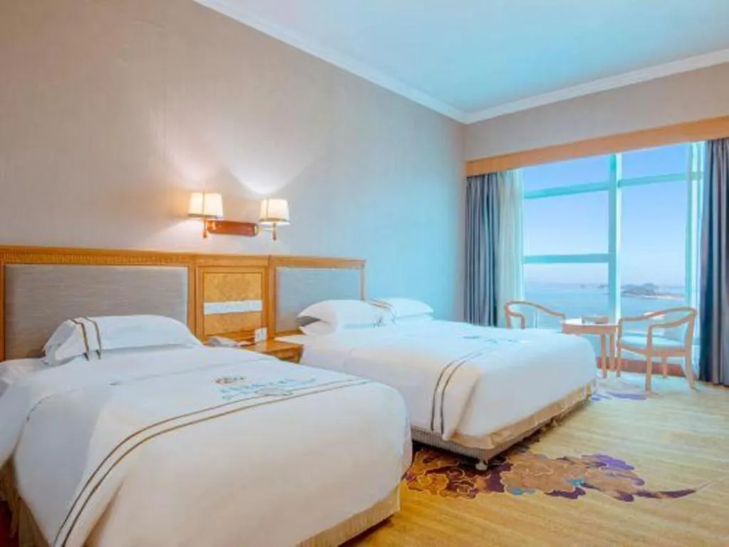 Bed in Zhuhai Dehan Hotel