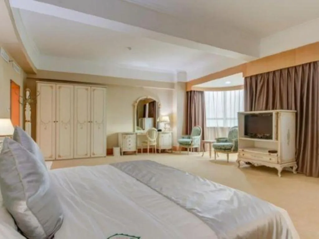 Bed in Zhuhai Dehan Hotel