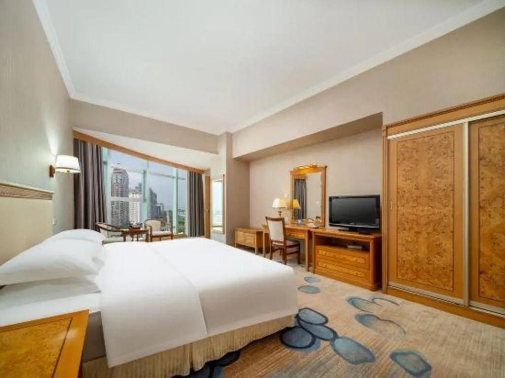 Bed in Zhuhai Dehan Hotel