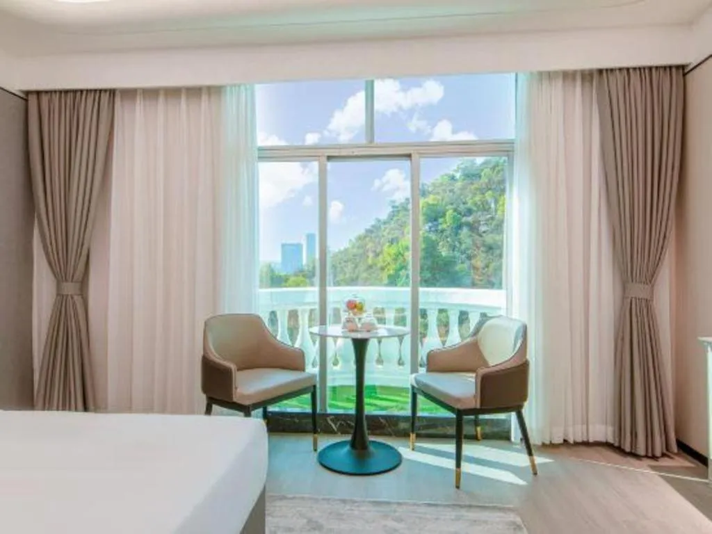 Bed in Zhuhai Dehan Hotel