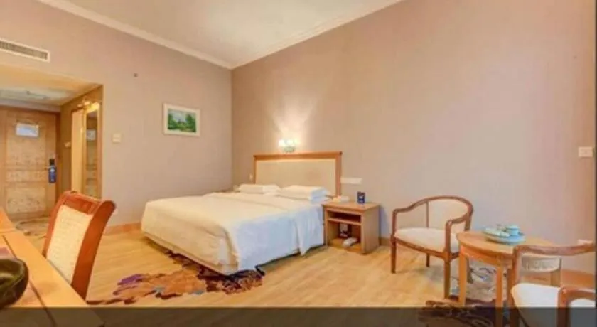 Bed in Zhuhai Dehan Hotel