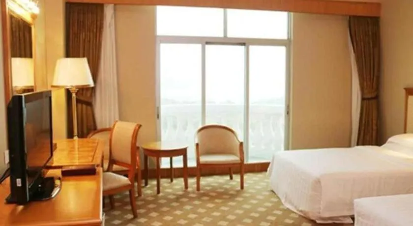 Bed in Zhuhai Dehan Hotel