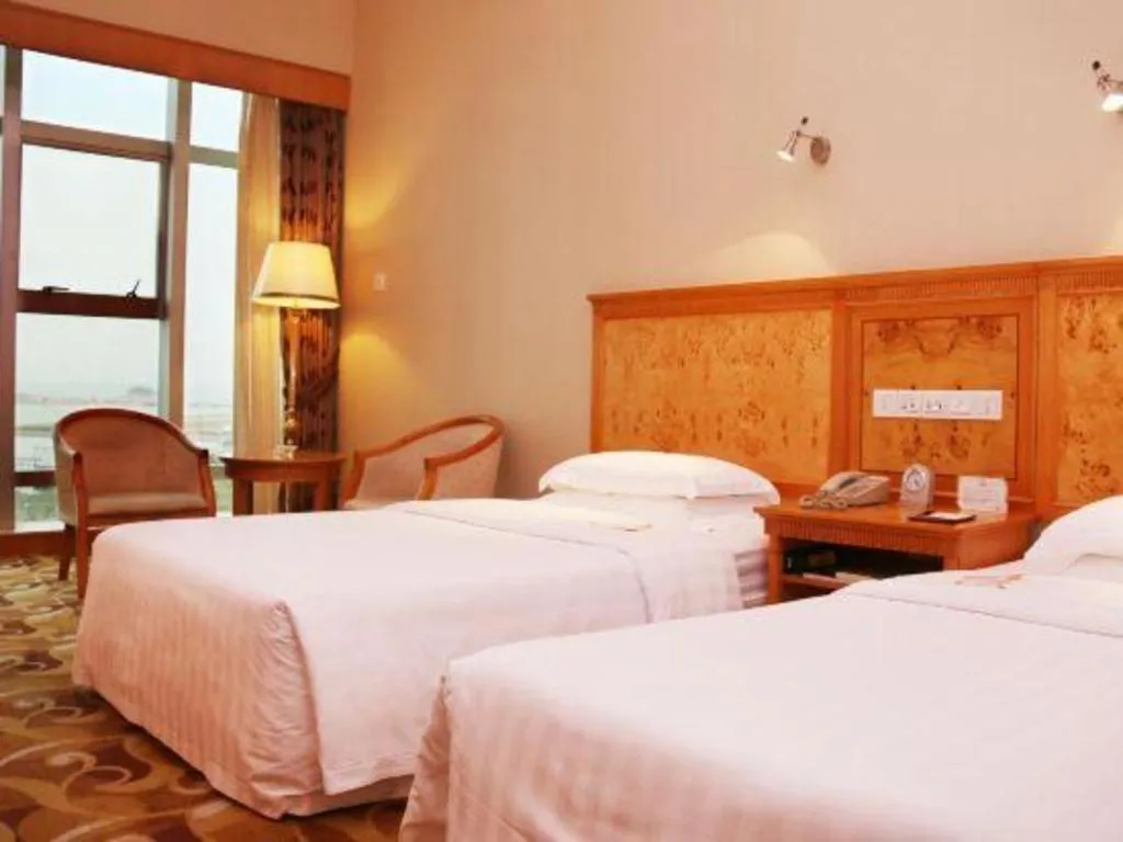 Bed in Zhuhai Dehan Hotel