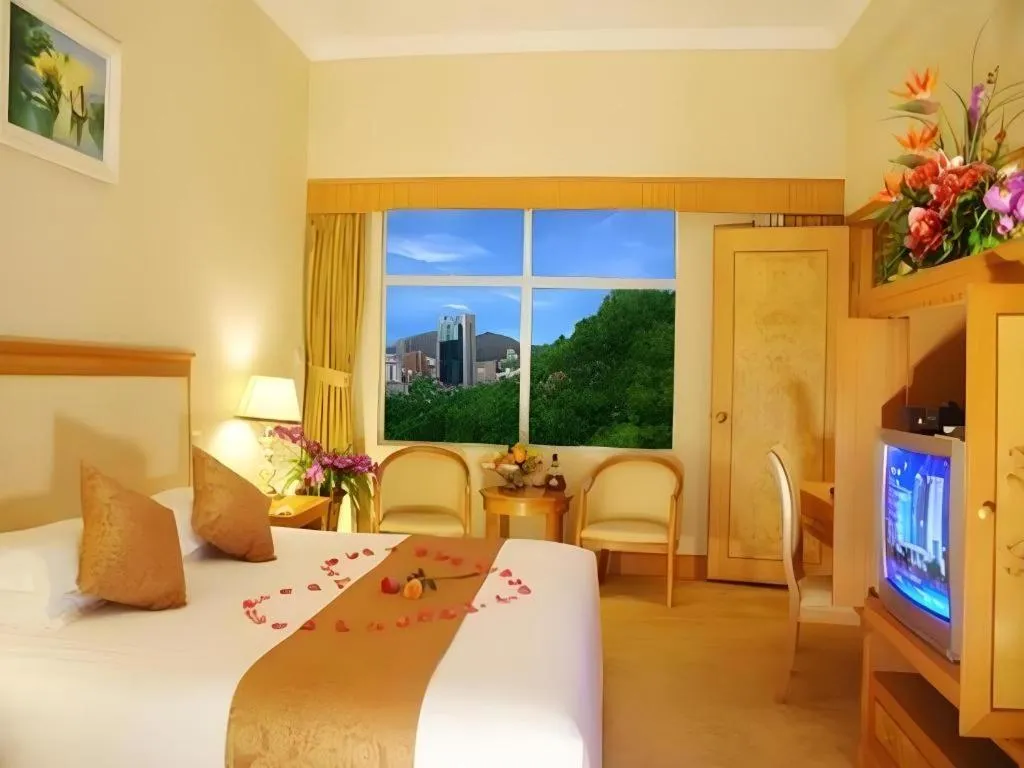 Bed in Zhuhai Dehan Hotel