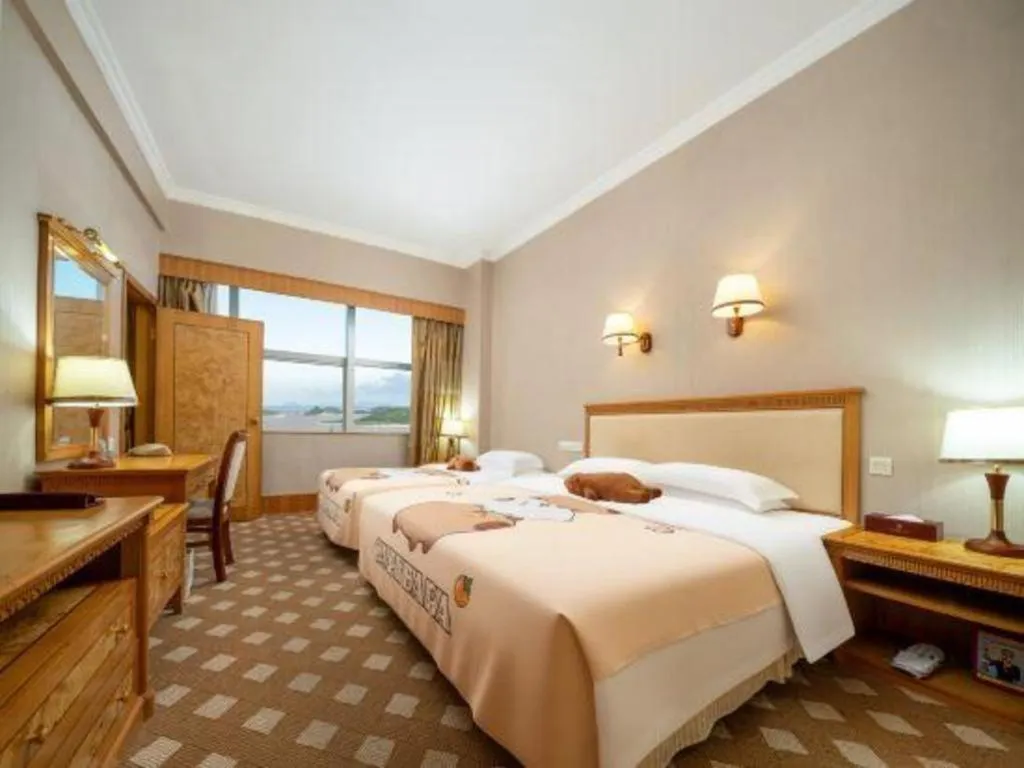 Bed in Zhuhai Dehan Hotel