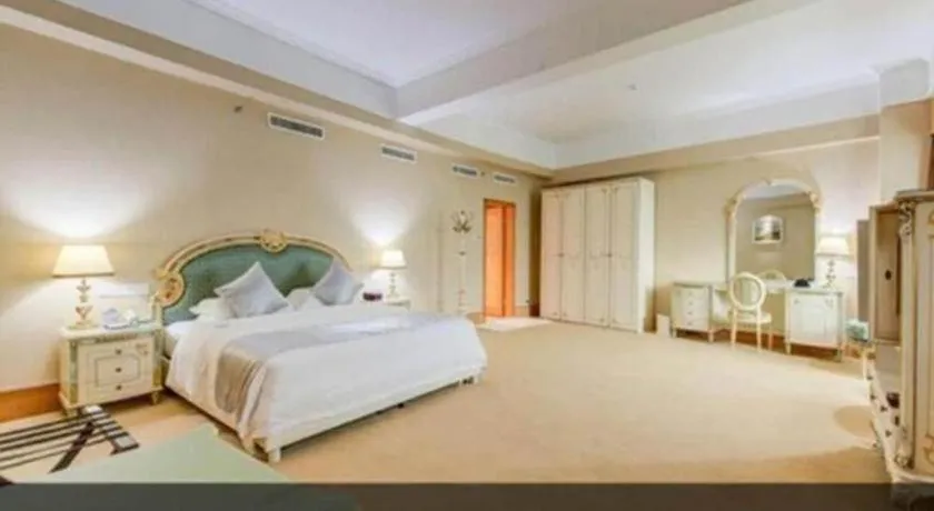 Bed in Zhuhai Dehan Hotel