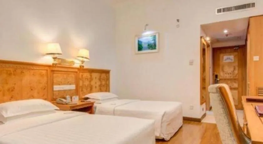 Bed in Zhuhai Dehan Hotel