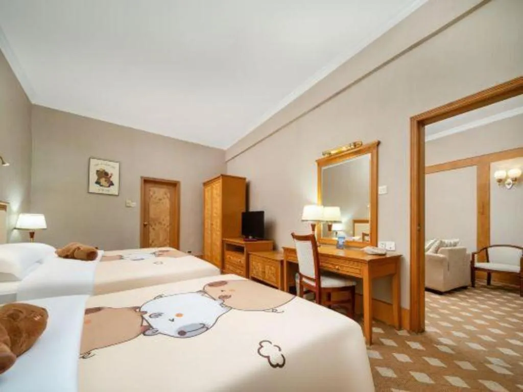 Bed in Zhuhai Dehan Hotel