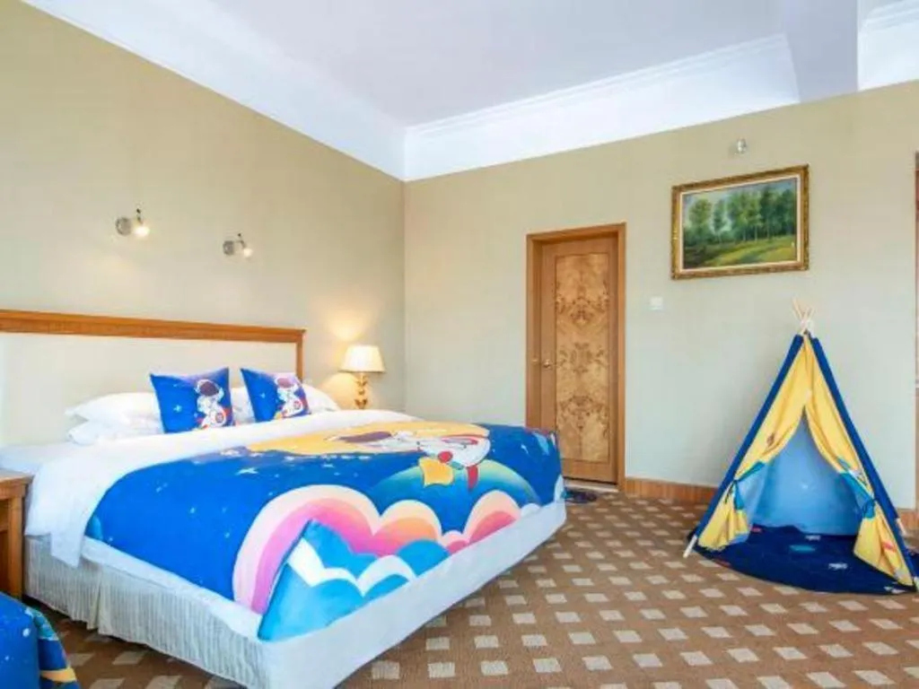 Bed in Zhuhai Dehan Hotel