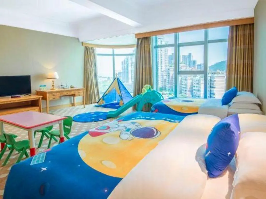 Bed in Zhuhai Dehan Hotel