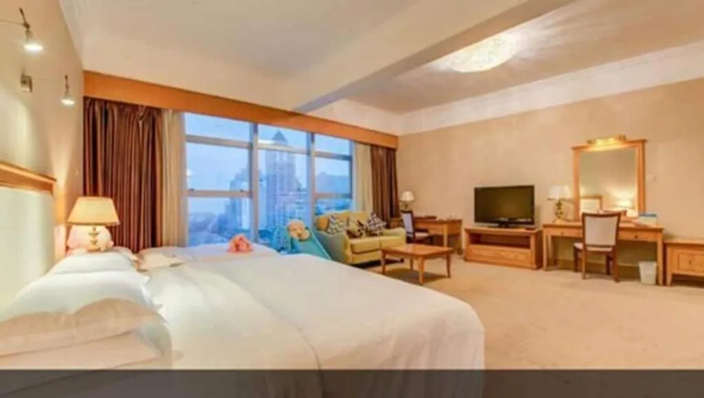 Bed in Zhuhai Dehan Hotel