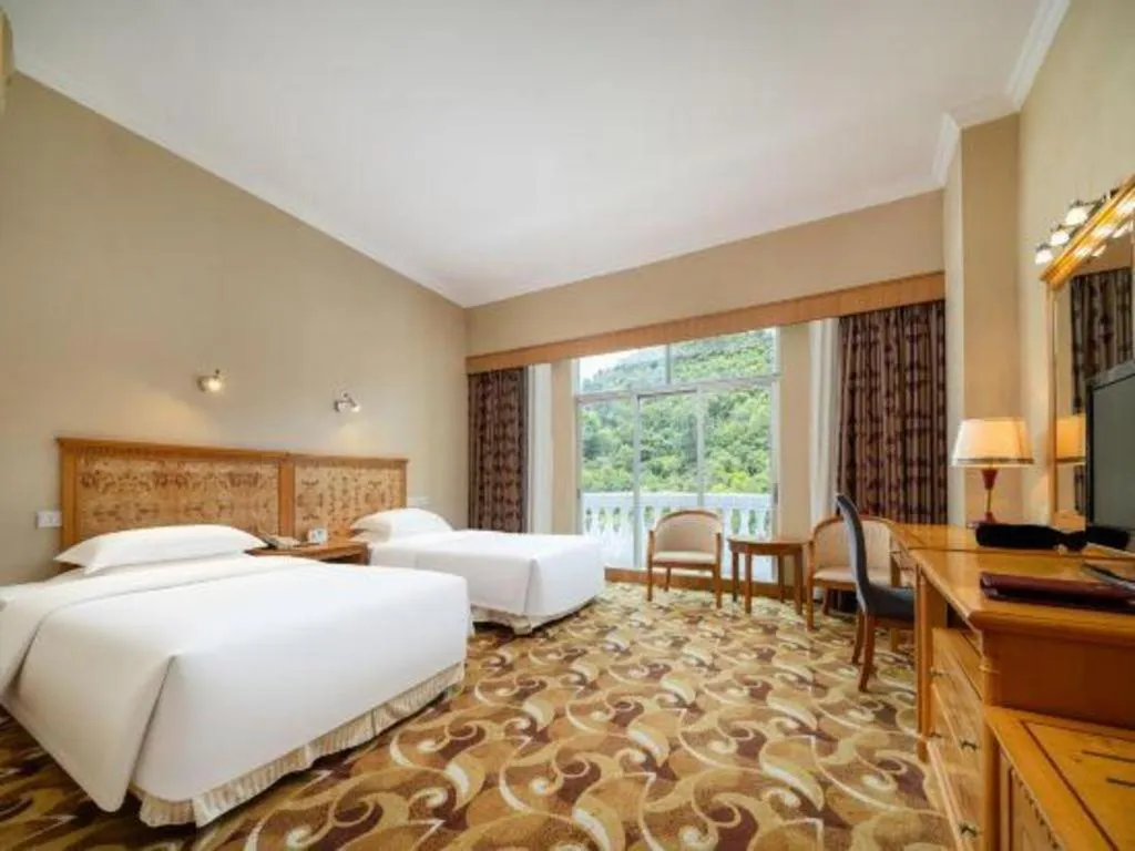 Bed in Zhuhai Dehan Hotel