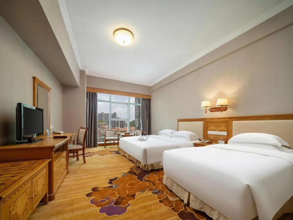 Bed in Zhuhai Dehan Hotel