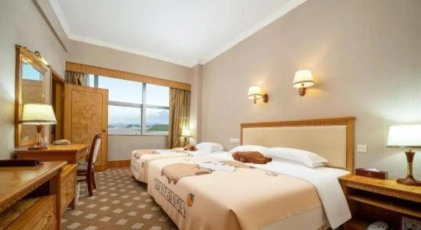 Bed in Zhuhai Dehan Hotel