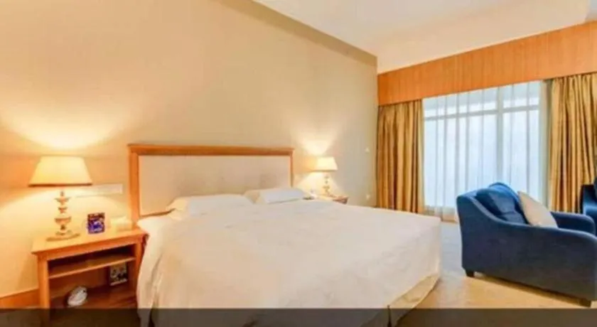 Bed in Zhuhai Dehan Hotel