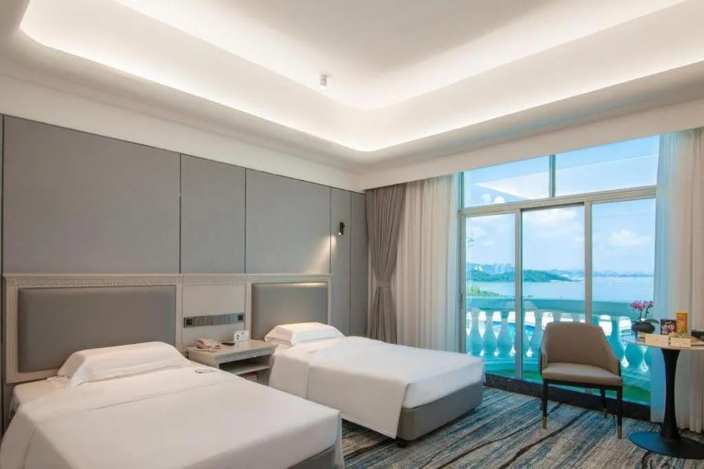 Bed in Zhuhai Dehan Hotel