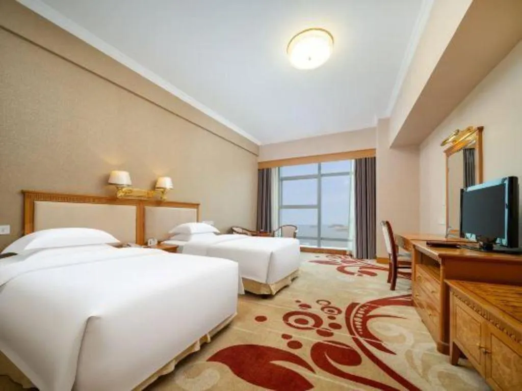 Bed in Zhuhai Dehan Hotel