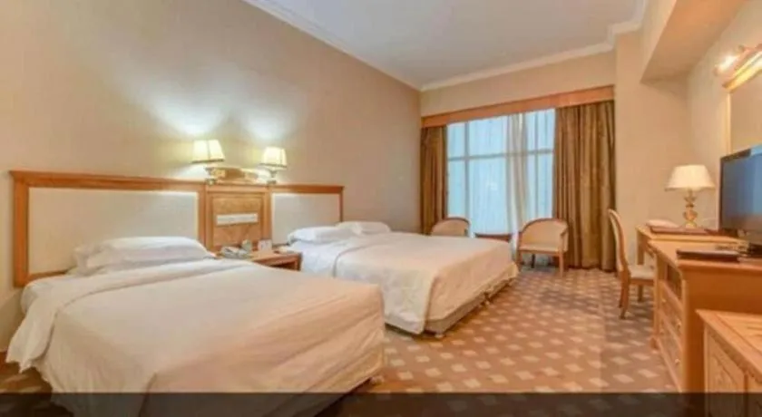 Bed in Zhuhai Dehan Hotel