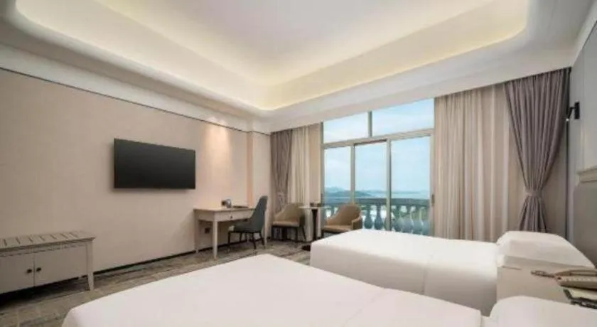 Bed in Zhuhai Dehan Hotel