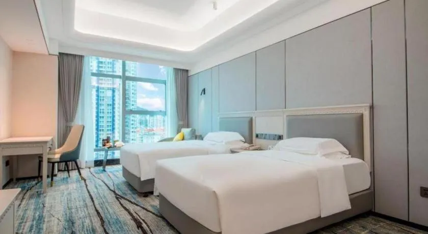 Bed in Zhuhai Dehan Hotel