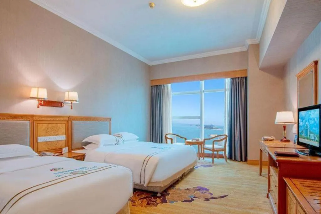 Bed in Zhuhai Dehan Hotel