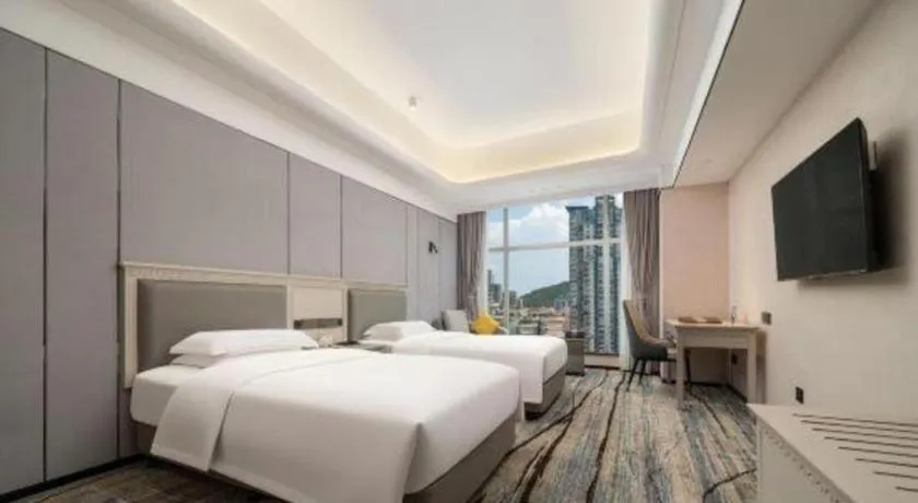 Bed in Zhuhai Dehan Hotel