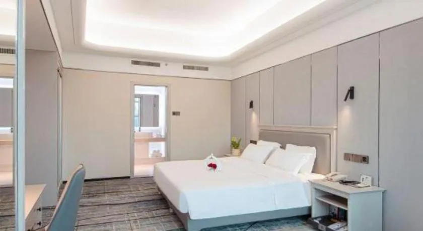 Bed in Zhuhai Dehan Hotel