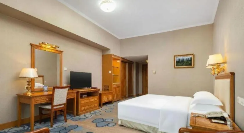 Bed in Zhuhai Dehan Hotel