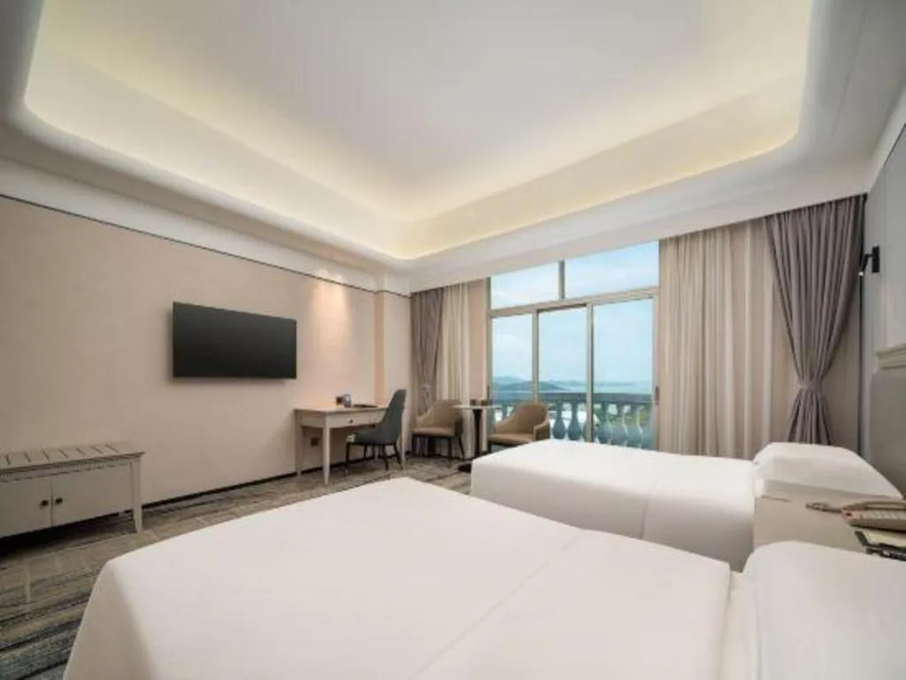 Bed in Zhuhai Dehan Hotel