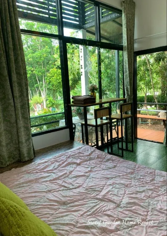 Bed in Sweet Garden Home Resort