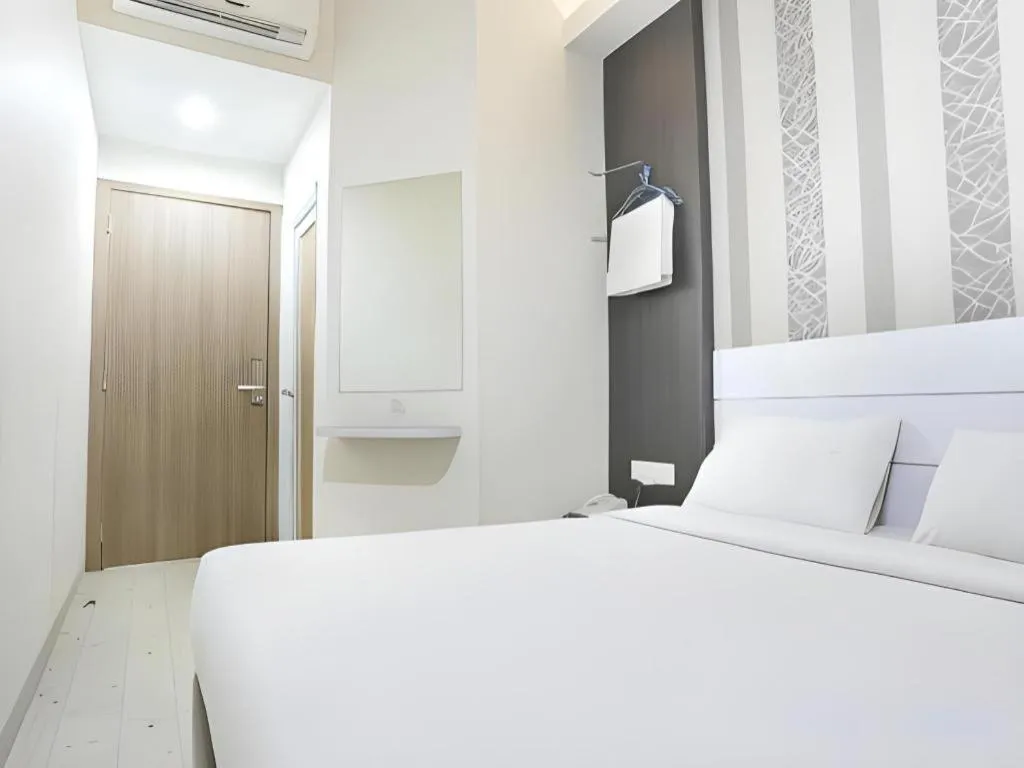 Bed in Redlink Hotel