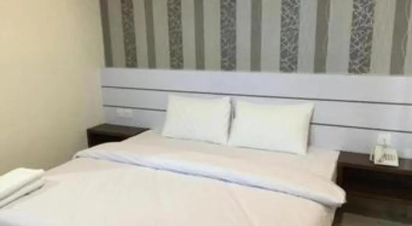 Bed in Redlink Hotel