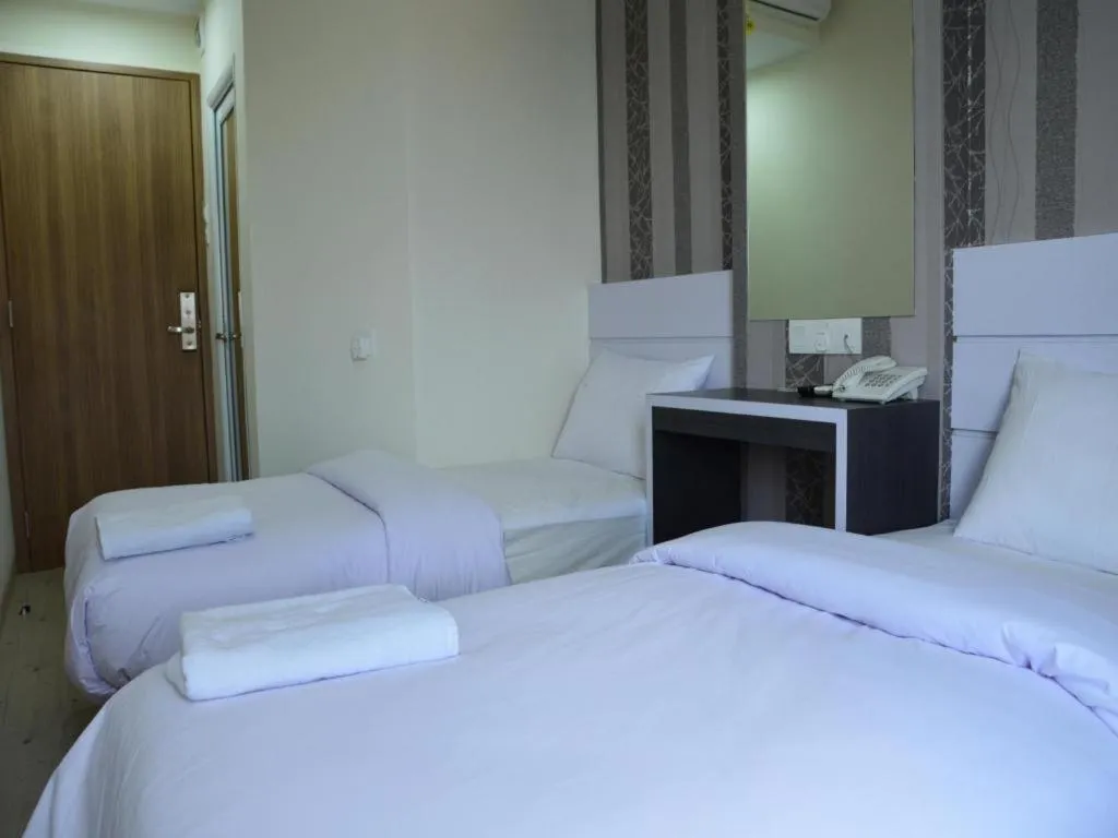 Bed in Redlink Hotel