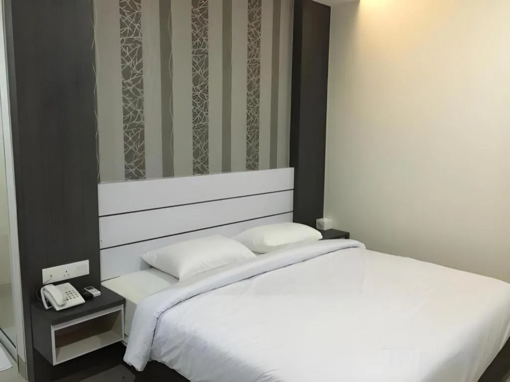 Bed in Redlink Hotel