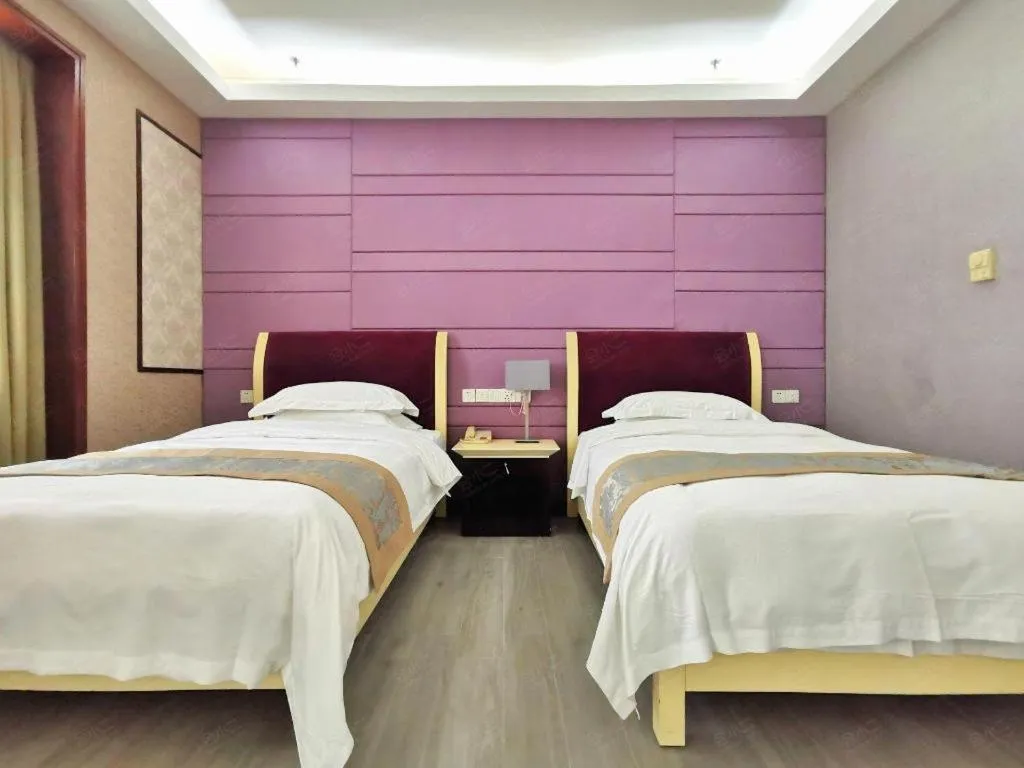 Bed in Hua Xia Pearl Hotel