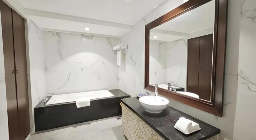 Bed in Hua Xia Pearl Hotel