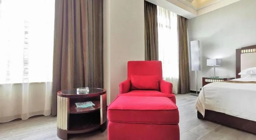 Bed in Hua Xia Pearl Hotel