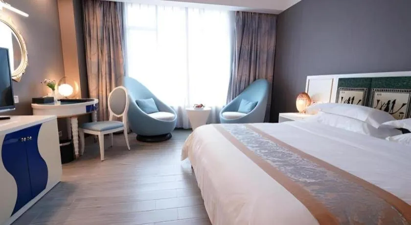 Bed in Hua Xia Pearl Hotel