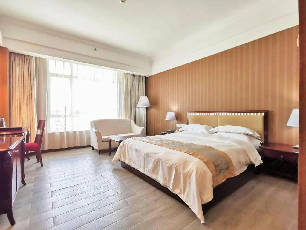 Bed in Hua Xia Pearl Hotel