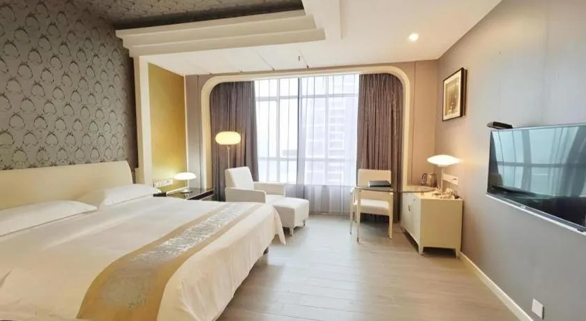 Bed in Hua Xia Pearl Hotel