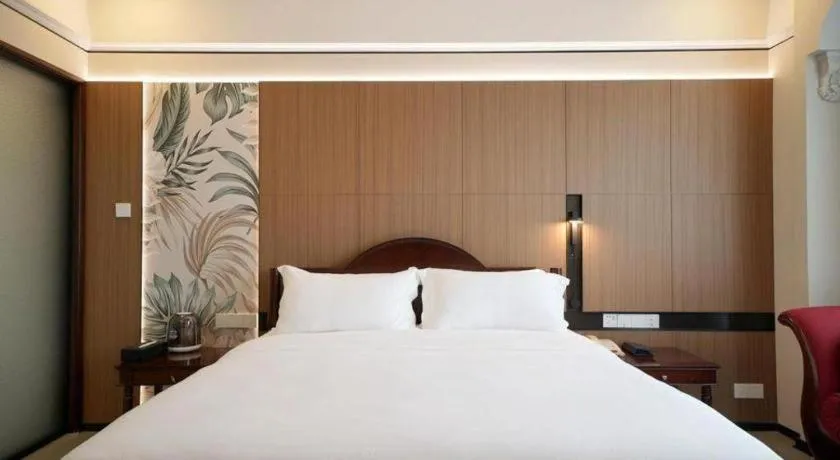 Bed in Hua Xia Pearl Hotel