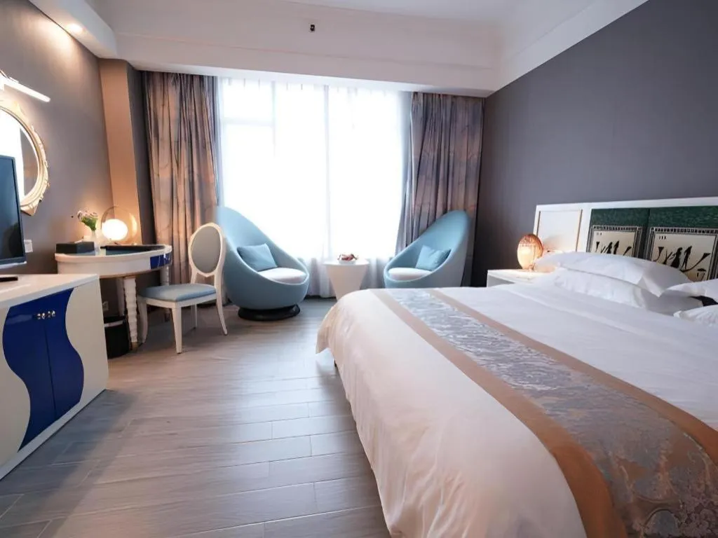 Bed in Hua Xia Pearl Hotel